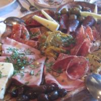 Antipasto Italiano · Prosciutto di parma, olives, artichokes, fresh mozzarella, tomatoes, provolone cheese & roas...
