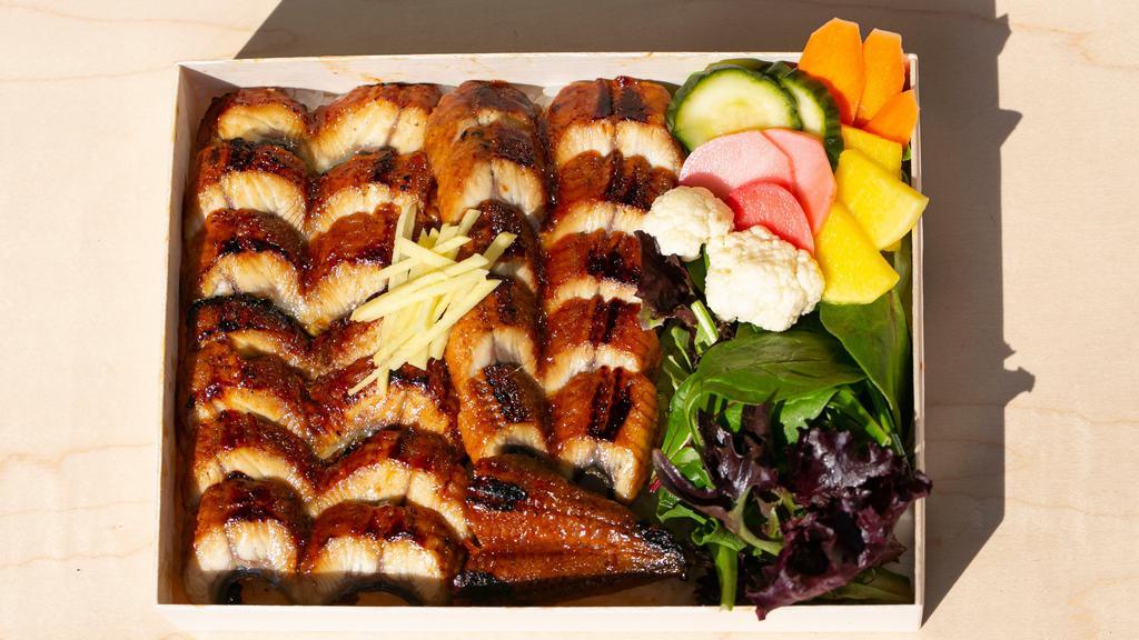 Unagi Don · Grilled Eel over rice, Fresh Salad, Assorted Pickles <br />