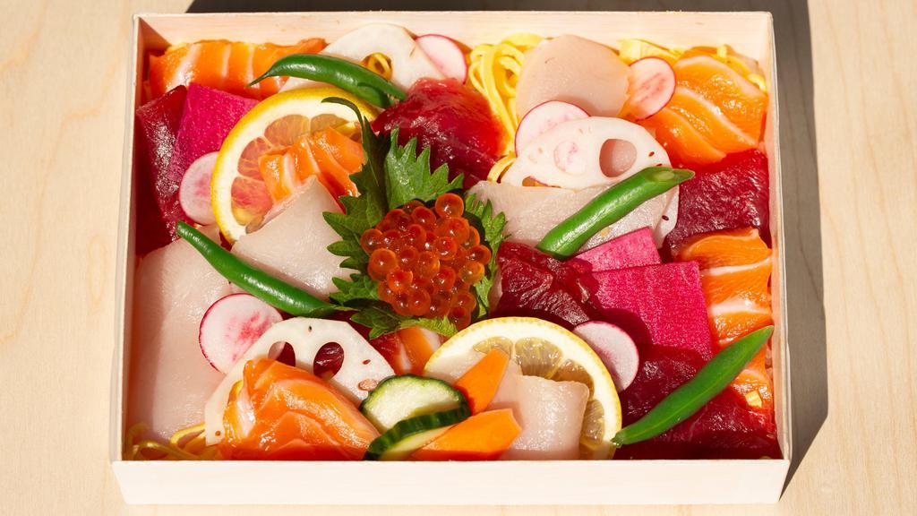 Kaisen Don · Assorted Sashimi, Ikura fish roe, Mixed greens with pickles, over rice