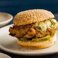 Fried Chicken Burger · Buttermilk Fried Chicken, Spicy Mayo, Pickles & Coleslaw On A Sesame Bun.