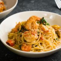 Shrimp Pasta · Grilled Shrimp, Spaghetti, Chilli Flakes, Tomatoes, Arugula, Lemon, Cream & Breadcrumbs.