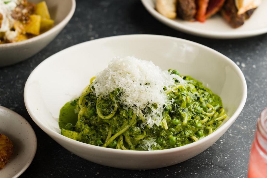 Pesto Pasta · Pumpkin Seed Pesto (Nut Free), Spaghetti, Peas, Zucchini, Snap Peas, Kale, Cream & Parmesan Cheese.