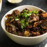 Brussels Sprouts · Crispy Brussels Sprouts Tossed In Salsa Verde.
