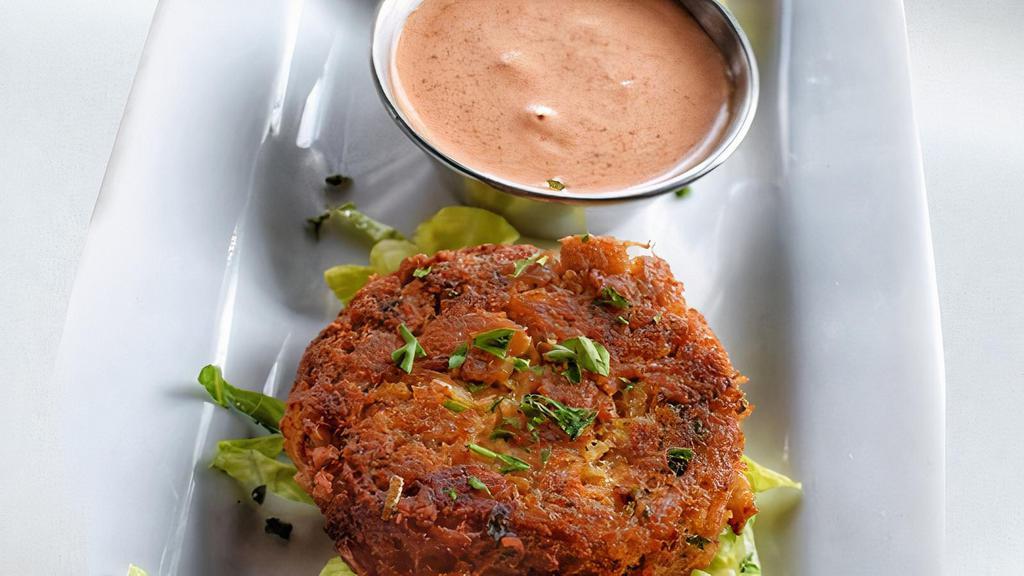 Crab Cakes · Served with remoulade sauce.
