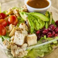 Hearty Chicken Avocado Salad · Mixed greens tossed with diced grilled chicken, creamy avocado, dried cranberries, and walnu...