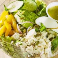 Avocado Green Goddess Salad · Crisp romaine tossed with avocado, feta, bell peppers, cucumbers, eggs, and red onions.  We ...