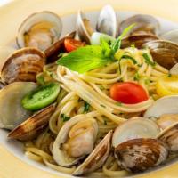 Linguine Alla Vongole · Linguine and white clams with garlic and olive oil.