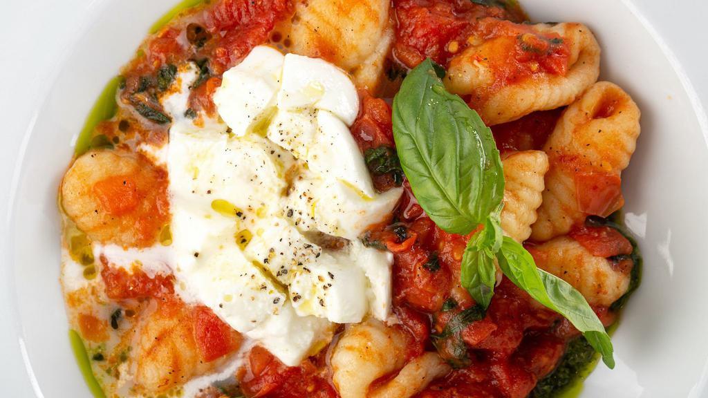 Gnocchi Lattanzi · Homemade Gnocchi with mozzarella and a fresh tomato sauce.