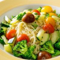 Capellini Primavera · Fine spaghetti with fresh vegetables in a light garlic butter sauce.