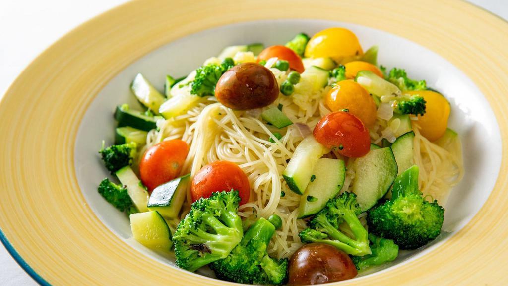 Capellini Primavera · Fine spaghetti with fresh vegetables in a light garlic butter sauce.