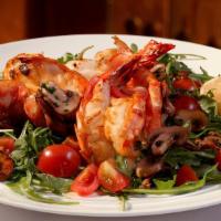 Scampi Angela · Grilled shrimp with garlic, white wine, and mushrooms.