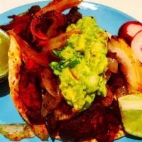 Chef'S Taco · Spicy pork and salted dried beef with corn tortilla, sauteed onions, and guacamole. Served w...