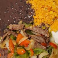 Bistec Fajita Bowl  · Steak Fajita , Onions, Mixed Bell Peppers Your Choice Of Beans And Rice, Lettuce, Mexican So...