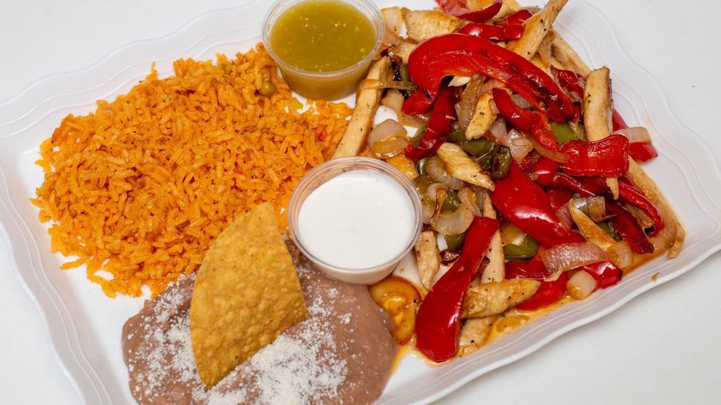 Pollo Fajitas Platillos · Chicken, Onions, Mixed Bell Peppers Served with Mexican Orange Rice And Refried Beans And 3- Corn Tortillas
