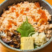 Sake Ikura Don · Cooked Salmon Fakes and Salmon roes feature with Shiitake mushrooms and Japanese omelet over...