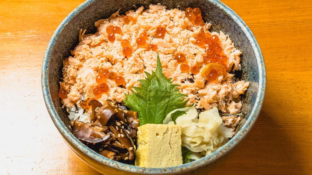 Sake Ikura Don · Cooked Salmon Fakes and Salmon roes feature with Shiitake mushrooms and Japanese omelet over the rice.