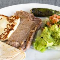 Bistec Poblano · Grilled rib-eye steak, guacamole, pico de gallo, queso blanco and grilled jalapeño peppers. ...
