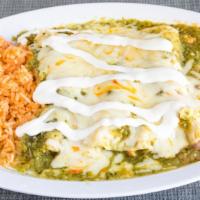 Queso Blanco Enchilada · Three rolled soft tortillas filled with queso blanco covered in green salsa and topped with ...