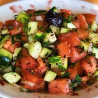 Shepherd Salad · Finely chopped tomatoes, cucumber, green pepper,onions, parsley, sumac, oil and red vinegar,...