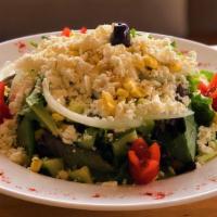 Mediterranean Salad · Mixed green salad, cherry tomatoes, cucumber, lemon, oil, onion, corn and cheese.