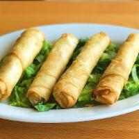 Cheese Rolls · Pan fried pastry dough stuffed with feta cheese and parsley.