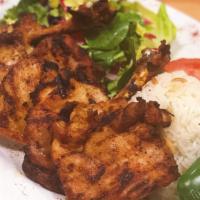 Chicken Chops · Marinated boneless chicken thighs grilled to your taste.