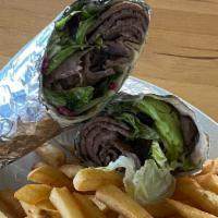 Lamb Gyro Wrap · Very thin slices of lamb with lettuce, tomatoes and onions.