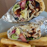 Chicken Shish Wrap · Grilled cubes of chicken with lettuce, tomatoes and onions.