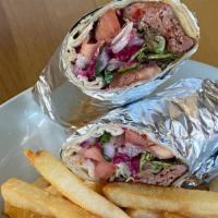 Adana Wrap · Grilled ground lamb with lettuce, tomatoes and onions.