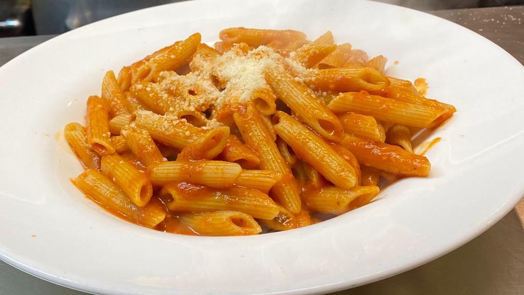 Penne Pasta With Tomato Sauce · Penne pasta with tomato sauce.