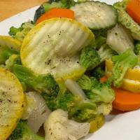 Steamed Vegetables · Carrot, broccolil, cauliflower, yellow and green zucchini, red pepper.