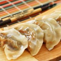Vegetable Dumpling · Eight pieces. Steamed or fried.