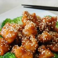 Sesame Chicken · Crispy chunk of chicken in sweet sesame sauce with broccoli.