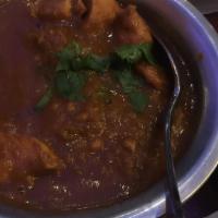 Saagwala Curry · Your choice of meat cooked with fresh spinach and spices.