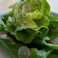 Butter Lettuce Salad · flambo radish, herbs, champagne vinaigrette