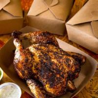 Combo #3 · Whole chicken, your choice of two sides, dipping sauce, and homemade cornbread.