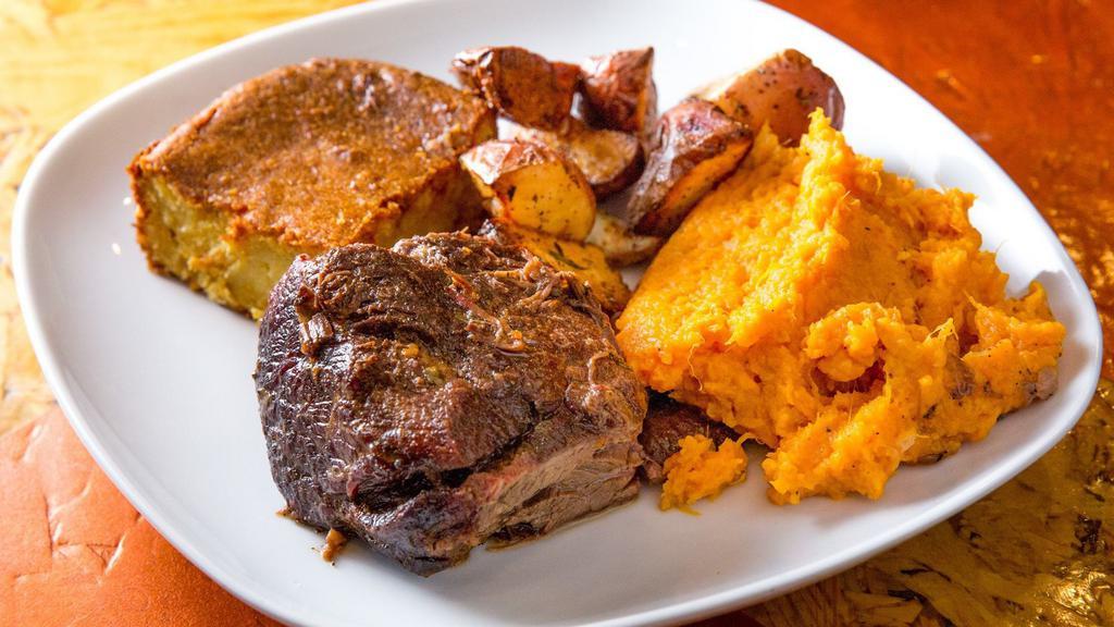 Short Rib Combo · Braised beef short ribs, your choice of two sides, dipping sauce, and homemade cornbread.
