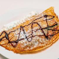 Banana, Strawberry & Nutella Crepe · Crepe stuffed with freshly diced bananas, strawberries and Nutella. Comes with whipped cream...