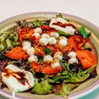Mixed Greens Salad · Mixed greens, parmigiana reggiano, red onions, roasted peppers, tomatoes and balsamic extra ...