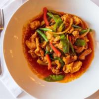 Bkk · Fried chicken asparagus, bell peppers, and onions in Thai homemade chili paste.