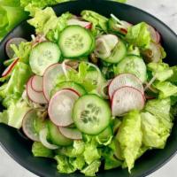 Kale And Romaine Caesar Salad · Pecorino and croutons.
