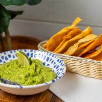 Guacamole & Chips (V) · Served with house tortilla chips. Gluten free.
