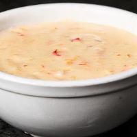New England Clam Chowder · Served with oyster crackers.