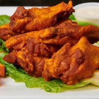8 Wings · Served with carrots, celery, and blue cheese.