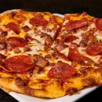 Meat Lovers Pizza · Served with shredded mozzarella, sausage, pepperoni, bacon, and Rockwell's pizza sauce.
