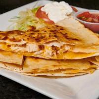 Chicken And Cheese Quesadilla · Filled with chunks of grilled chicken, Monterey Jack and cheddar cheeses, served with salsa ...