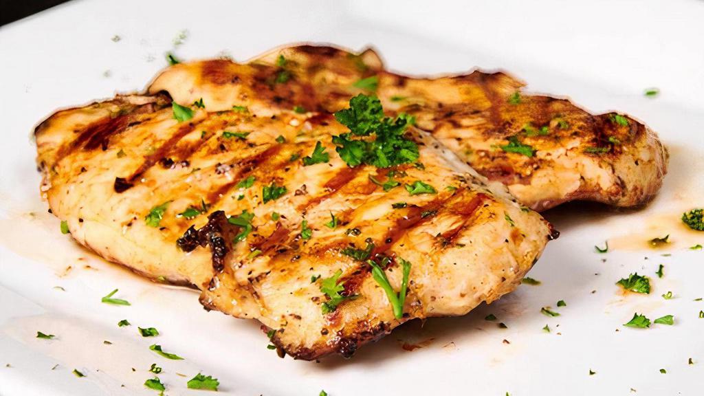 Grilled Chicken · Two tender boneless chicken breasts marinated with Italian herbs and spices, served with your choice of side.