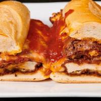Chicken Parmesan Sandwich · Tender chicken breast, breaded, deep fried covered with marinara sauce, topped with melted m...