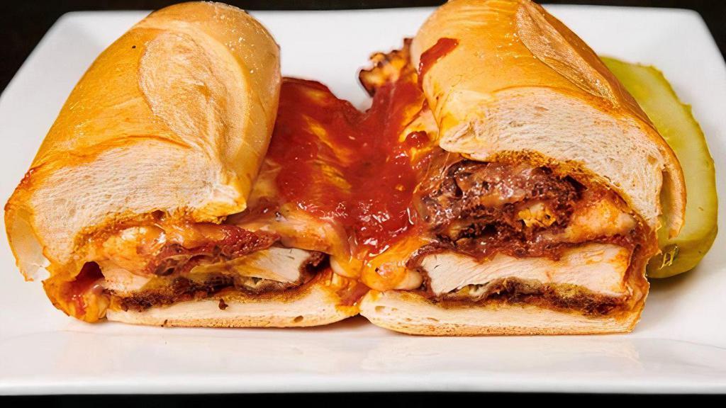 Chicken Parmesan Sandwich · Tender chicken breast, breaded, deep fried covered with marinara sauce, topped with melted mozzarella cheese.