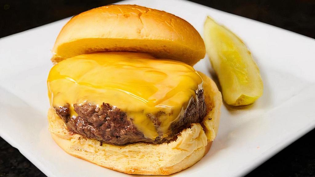 Cheeseburger · Served with a pickle spear and choice of side.